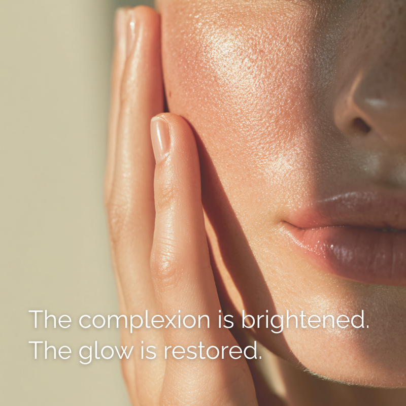 Close-up of a person's face with smooth skin and text 'The complexion is brightened. The glow is restored.'