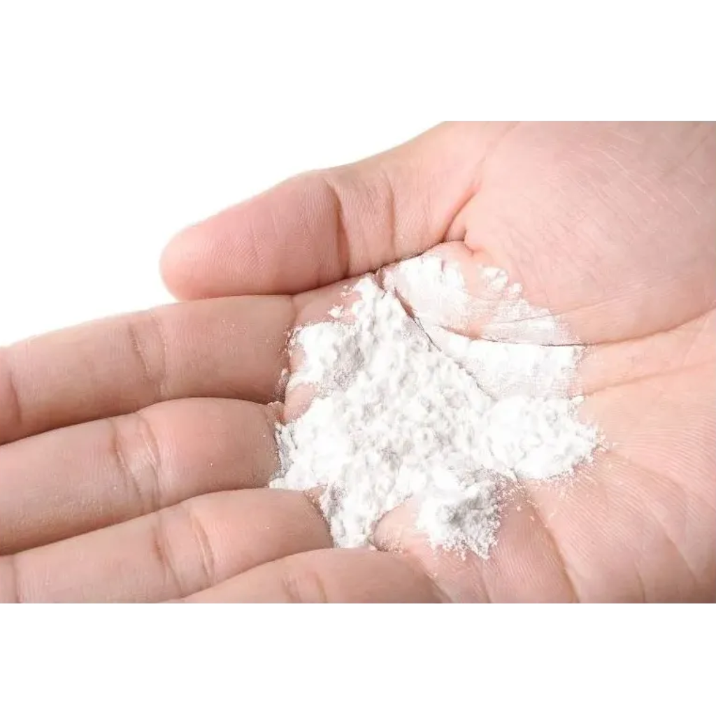 close-up of bernard cassiere gentle peeling powder in the palm of a hand