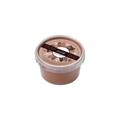A small round plastic tub of a chocolate mask from bernard cassiere with a clear lid on a plain white background.