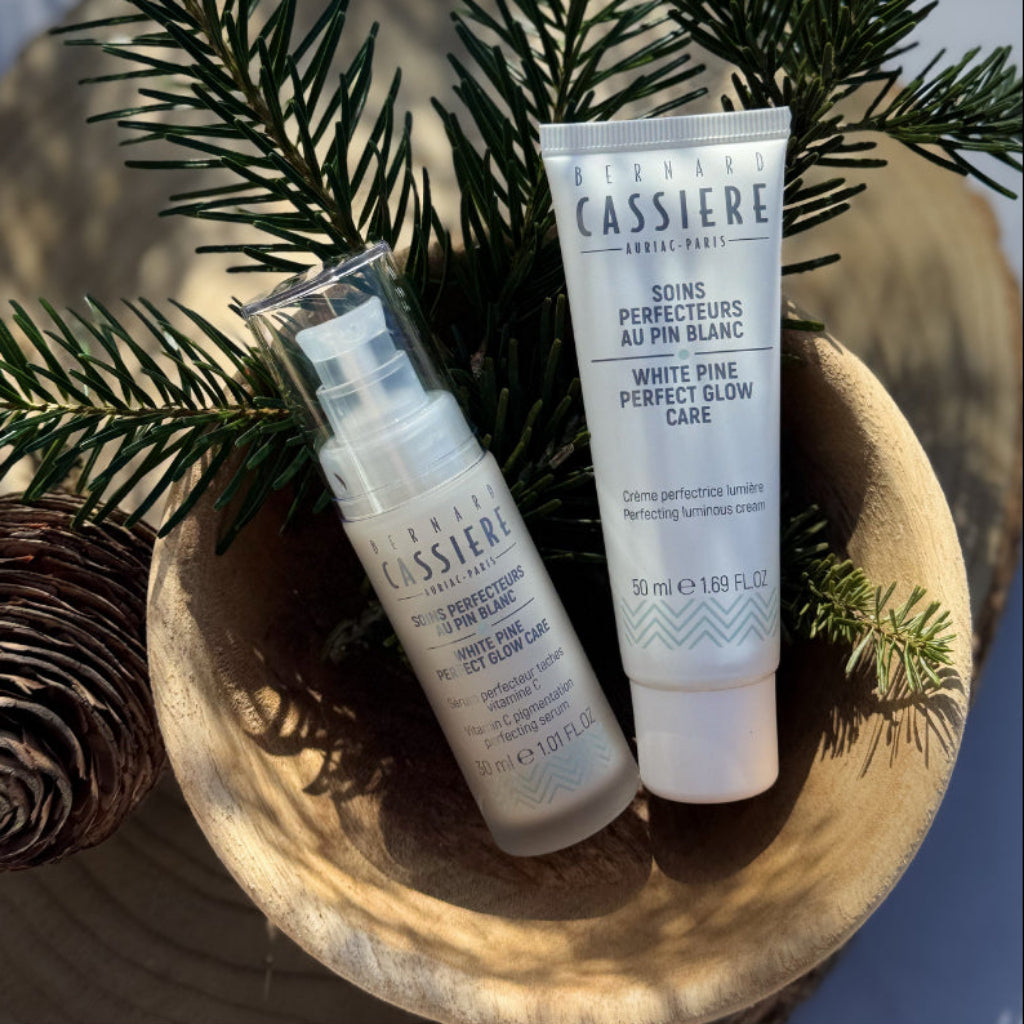 Tube of Bernard Cassiere Perfecting Luminous Cream for a more unifying, radiant complexion. Targets hyperpigmentation. Next to Bernard Cassiere Vitamin C Pigmentation Perfecting Serum 